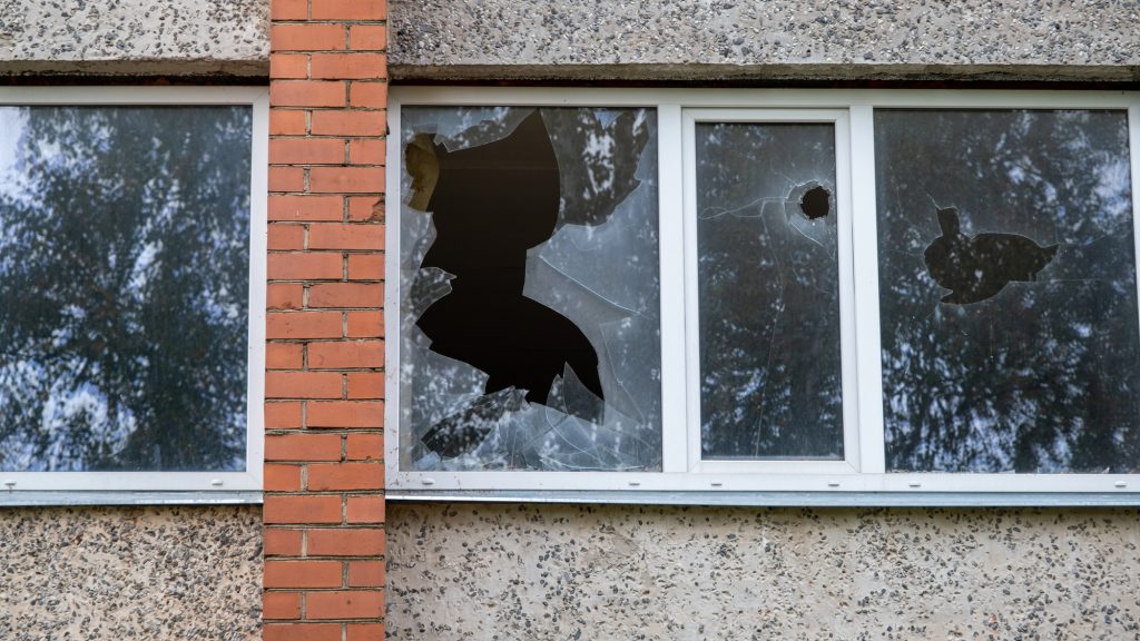 Broken Home Window after a Break-In - Florida Types of Property Crimes - Lawyers for Arson, Burglary, Criminal Mischief, Trespass in Jacksonville, FL